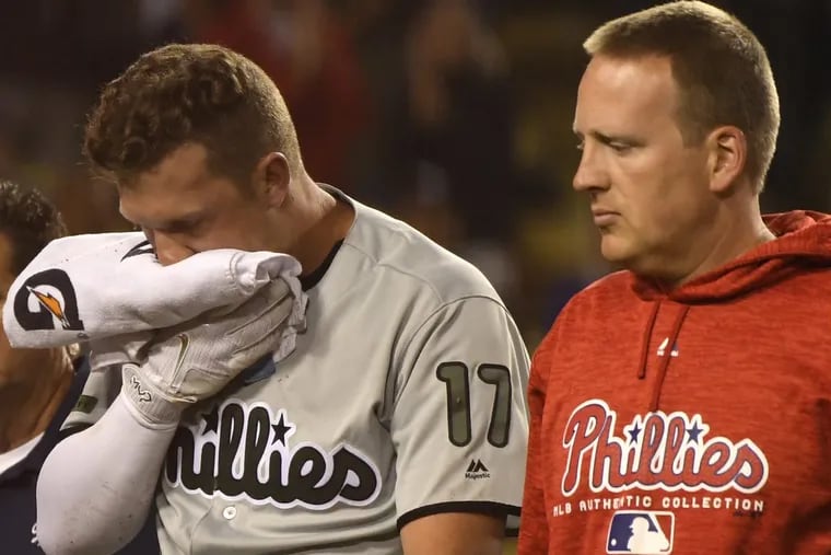 Phillies leftfielder Rhys Hoskins was hit in the face by a foul ball during the ninth inning of a baseball game against Los Angeles Dodgers on Monday.