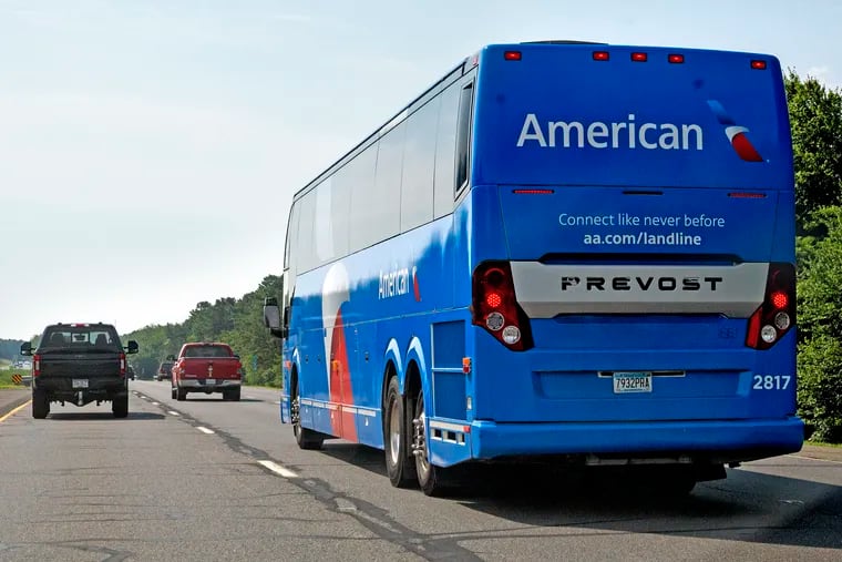 An American Airlines motorcoach operated by Landline travels on the Atlantic City Expressway.