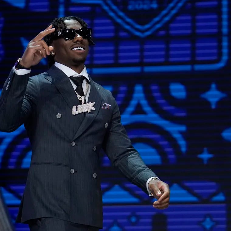 Toledo cornerback Quinyon Mitchell walks on stage during the first round of the NFL football draft, Thursday, April 25, 2024, in Detroit. (AP Photo/Jeff Roberson)