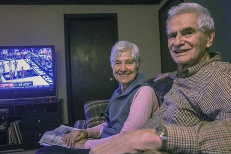Ron and Joy Pott of Malvern watch sports together to help Ron cope with his Alzheimer’s  Disease. .