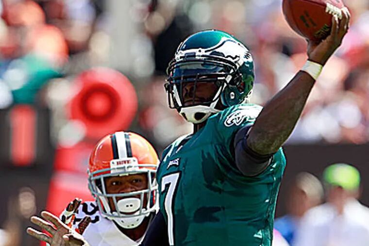 Michael Vick threw four interceptions in the Eagles' 17-16 win in Cleveland. (Yong Kim/Staff Photographer)
