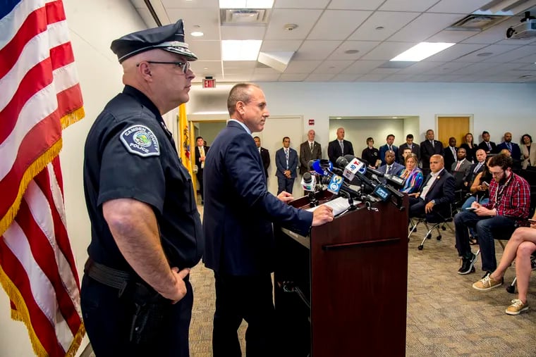 Bill Townsend (right), chief of detectives for the Camden County Prosecutor's Office and Assistant Chief Joseph Wysocki of the Camden County Police Department (left), discuss an arrest in the kidnapping of Curtis Jenkins III at a news conference.
