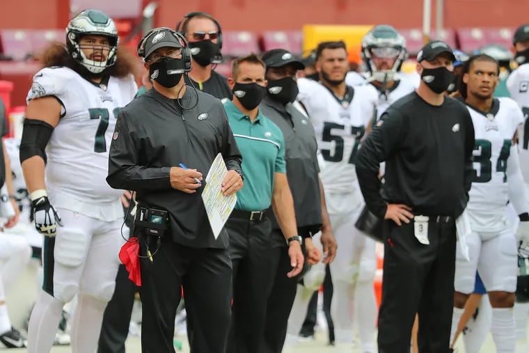 Eagles head coach Doug Pederson (left) on the sideline during the fourth quarter of Sunday's loss at Washington..