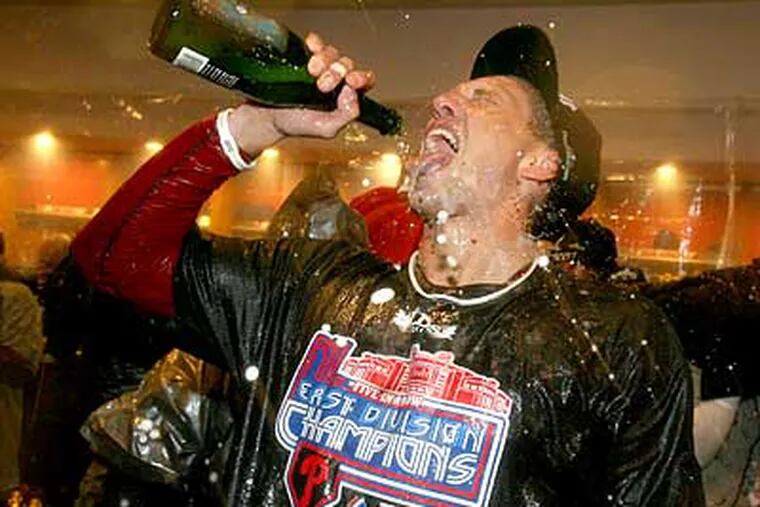Hunter Pence and the Phillies celebrated their fifth straight division title on Saturday. (Charles Fox/Staff Photographer)
