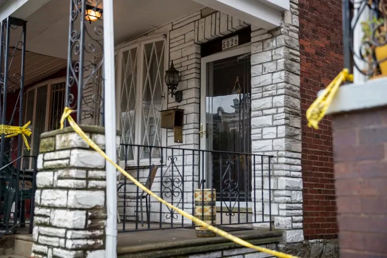 The home on the 5000 block of Walton Avenue after a quadruple shooting occurred. Maurice Louis, 29, is charged with four counts of murder in the shooting deaths of his mother, his stepfather, and two half brothers.