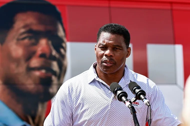 Republican U.S. Senate candidate Herschel Walker speaking to a crowd of voters while campaigning in Emerson, Ga., on Sept. 7.
