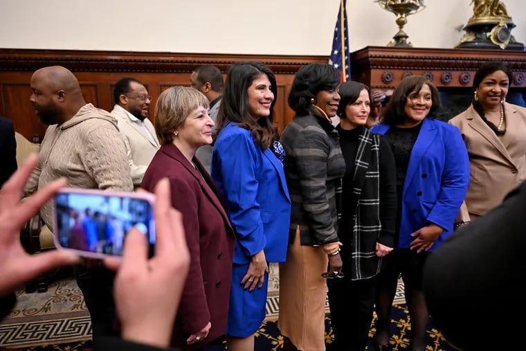 Mayor Cherelle L. Parker (third from left)) poses with her just-announced new appointees following a news conference on Feb. 5, 2024. From left: Sharon C. Ward, deputy education officer; Debora Carrera, chief education officer; Kristin Del Rossi, streets commissioner; Crystal Jacobs Shipman, sanitation commissioner; and Jazelle Jones, city representative and director of special events.