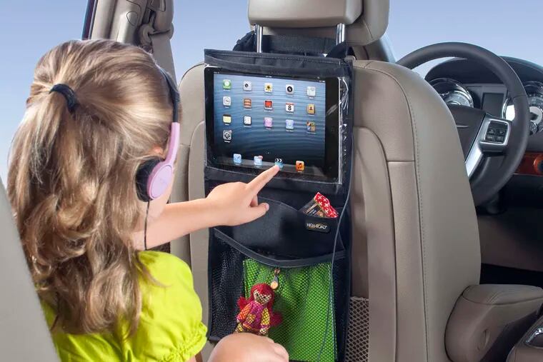 A tablet holder ($12.99) hangs from the seat and provides a protective plastic case.