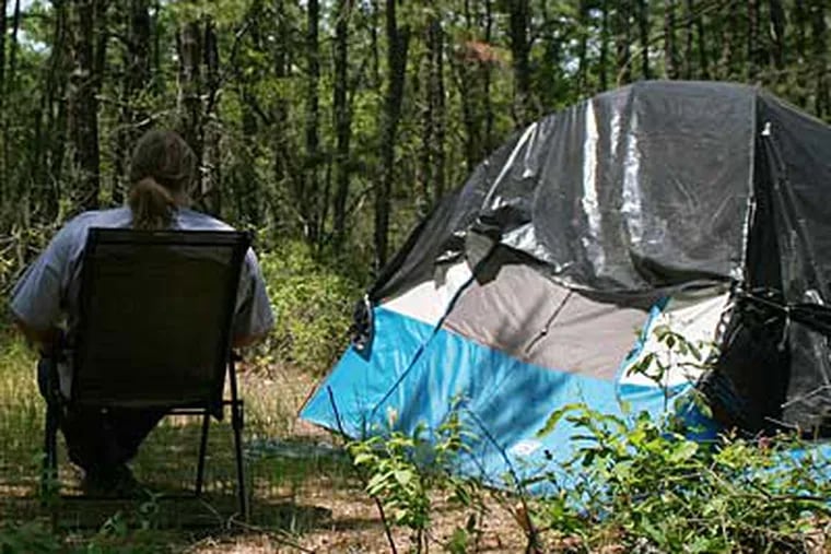 Pete Chineri sits at the Pemberton Township, N.J., campsite he's been using for about six months. (JORDAN M. SHAYER / For the Daily News)