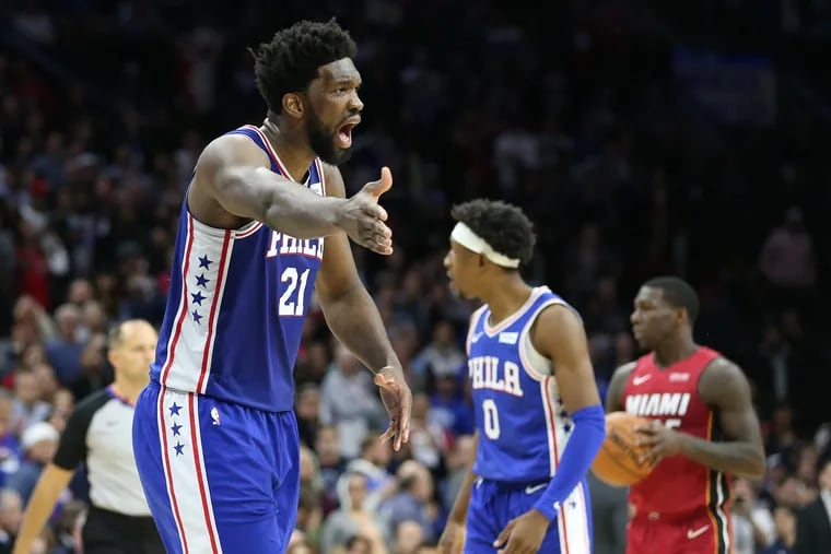 Joel Embiid arguing with an official during the Sixers' loss to the Heat on Wednesday.