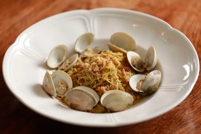 Southwark's clam pasta, glazed in a bisquey green garlic sauce and amped with pureed soft-shell crabs.
