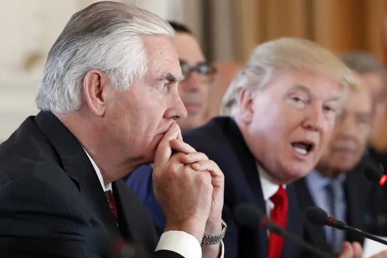 Secretary of State Rex Tillerson listens as President Trump speaks during a bilateral meeting with Chinese President Xi Jinping at Mar-a-Lago on Friday.