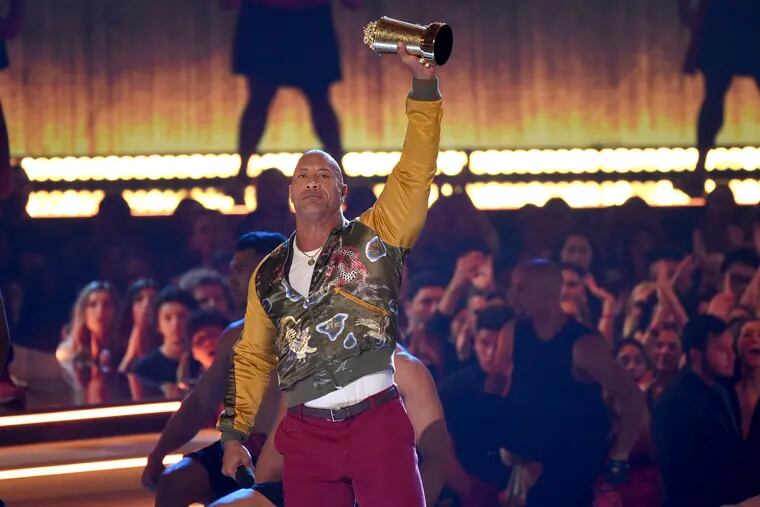 Dwayne "The Rock" Johnson accepts the generation award at the MTV Movie and TV Awards on Saturday, June 15, 2019, at the Barker Hangar in Santa Monica, Calif. (Photo by Chris Pizzello / Invision/AP)