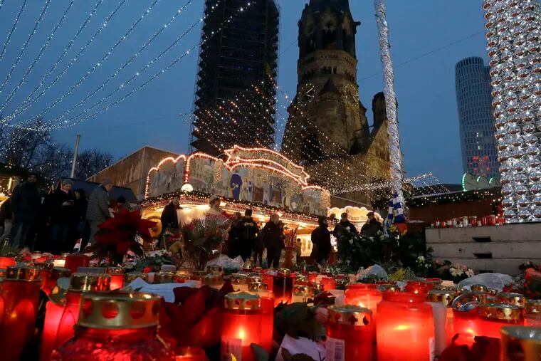 The Christmas market in Berlin , where a truck attack killed 12 people Monday, has reopened already. AP