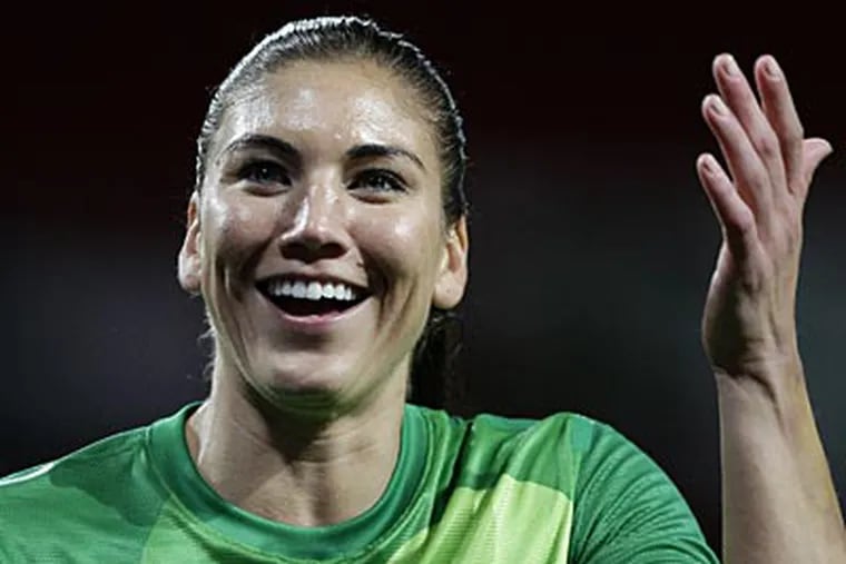 "I need to wrap my head around what just happened," Hope Solo said after Monday's game. (AP Photo)
