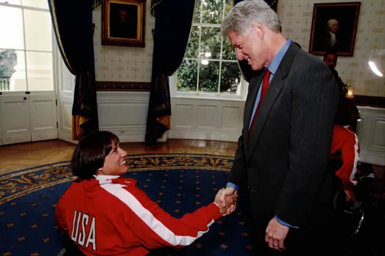 Mrs. Hand, a member of two U.S. Paralympic equestrian teams, met President Bill Clinton at the White House.