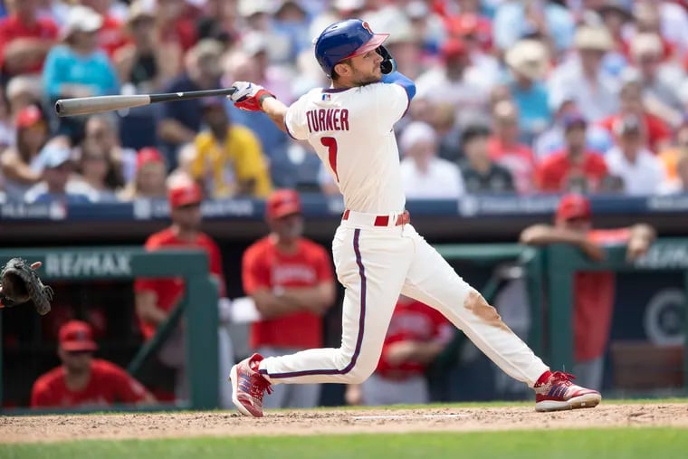 Trea Turner hits a double for the Phillies in the fifth inning against the Angels.