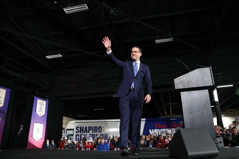 Josh Shapiro takes the stage at his election night watch party at the Greater Philadelphia Expo Center in Oaks, Pa.