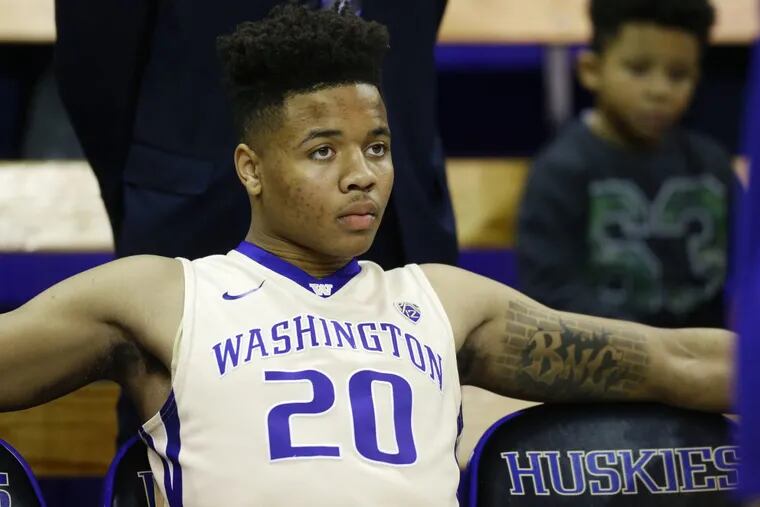 Washington guard Markelle Fultz sits on the bench before being introduced for the team's NCAA college basketball game against Arizona State, Thursday, Feb. 16, 2017, in Seattle.
