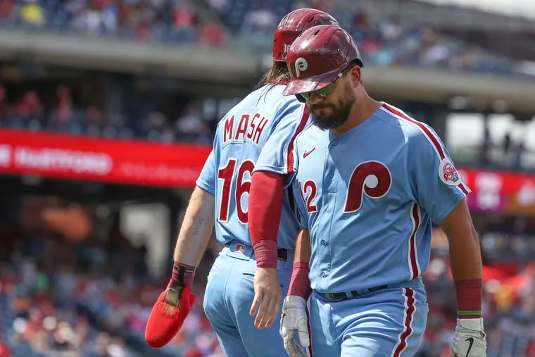 Brandon Marsh (16) replaces Philadelphia Phillies left fielder Kyle Schwarber on first base after Schwarber drew a walk in the bottom of the fifth inning against the Marlins on Thursday.