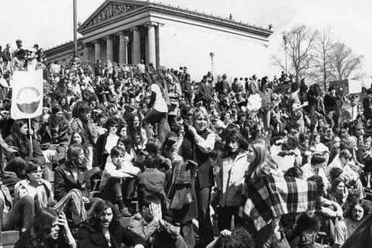 Philadelphia's first Earth Day celebration, in 1970, was led by Ira Einhorn, left, and drew hordes of environmental activists to a rally outside the Art Museum.