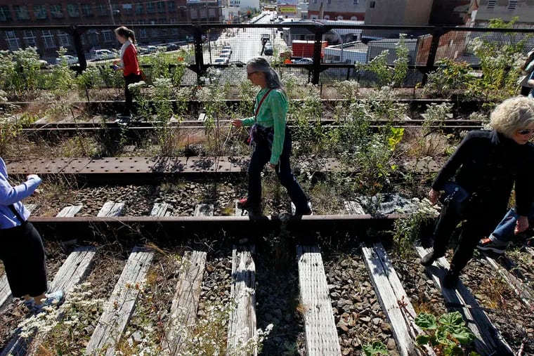 ALEX BRANDON / ASSOCIATED PRESS The initial phase of the Reading Viaduct project would turn a quarter-mile spur of the elevated railway into green space, similar to Manhattan's High Line Park. Construction could begin this summer.