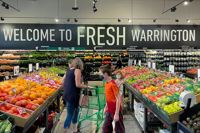 People shop inside the new Amazon Fresh grocery store off Easton Road in Warrington, Pa., on Aug. 5, 2021.
