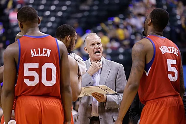 Doug Collins is a reminder that a coach's popularity doesn't have anything to do with a team's success. (Michael Conroy/AP)