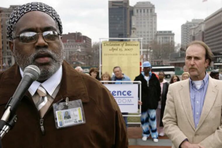 Harold Wilson (left), sentenced to die for a triple murder, and Ray Krone, who spent 10 years in an Arizona prison for a homicide - both exonerated by DNA evidence - attend yesterday&#0039;s rally on Independence Mall calling for a moratorium on capital punishment in Pennsylvania.