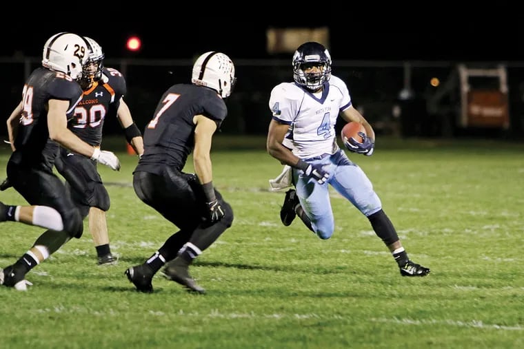 North Penn's Nyfease West (4) runs with the ball during their high school football game against Pennsbury's , Friday Oct. 23, 2015, in Levittown Pa.