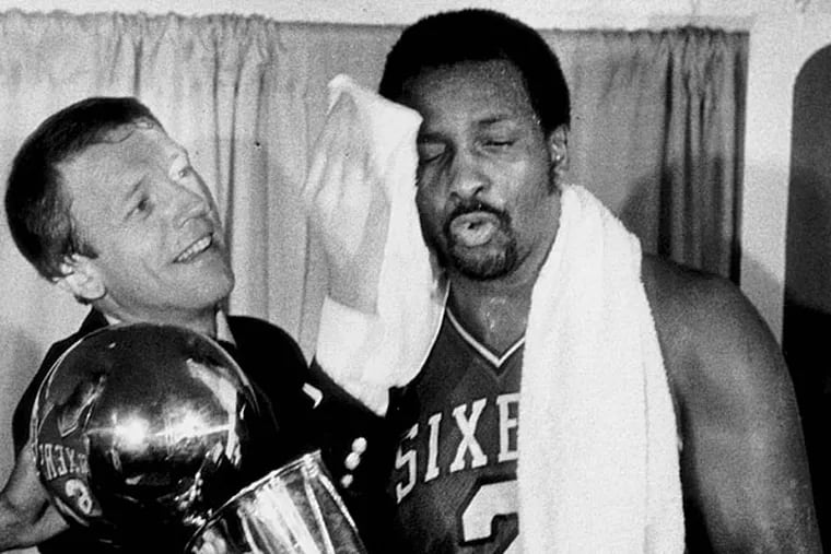 Sixers head coach Billy Cunningham and Moses Malone after Sixers championship win in 1983.