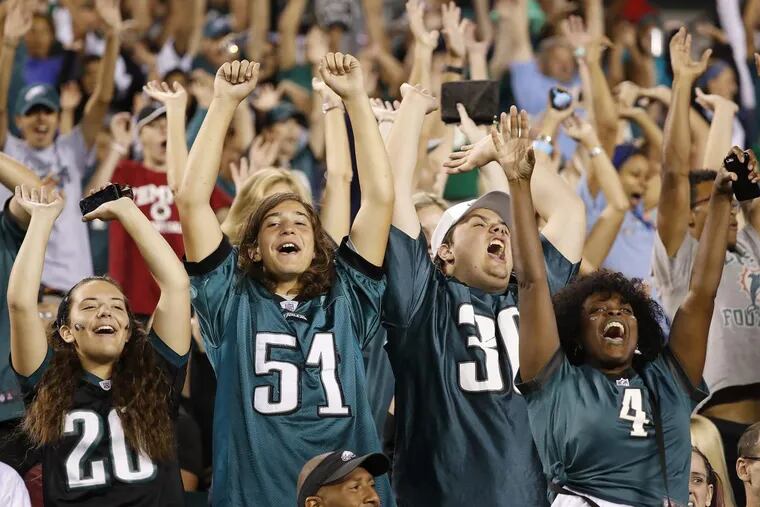 Fans do the wave during the Birds matchup against the Miami Dolphins.
