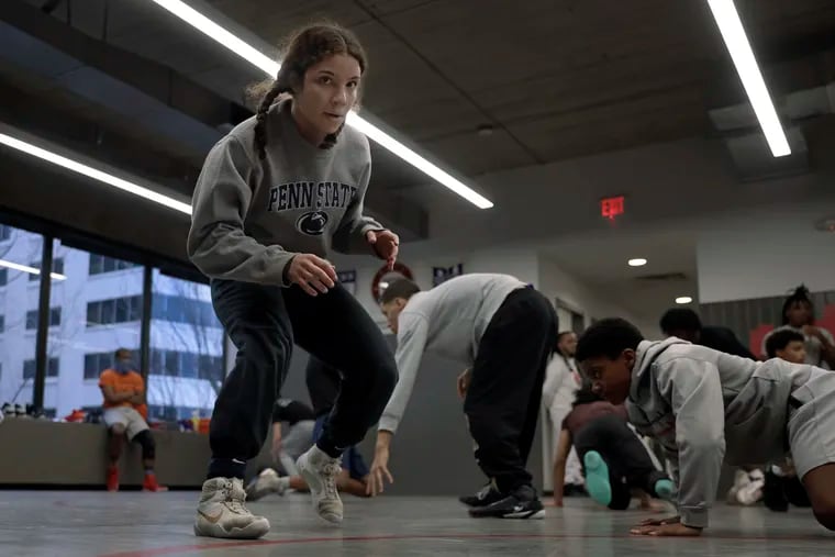 Mariana Bracetti freshman Julissa Ortiz works out during wrestling practice on Feb. 22 at Beat the Streets. Ortiz is the first girls to win a Public League wrestling title.