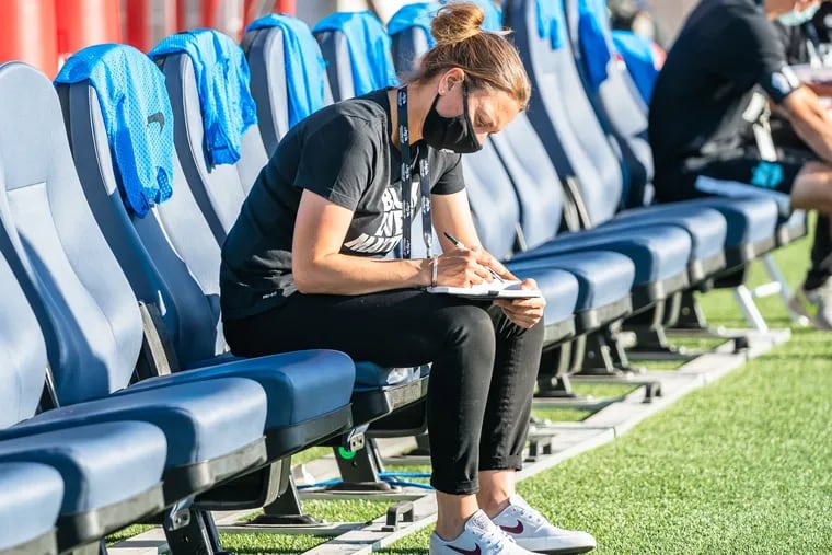 Sky Blue FC manager Freya Coombe on the bench during a NWSL Challenge Cup game against OL Reign last June.