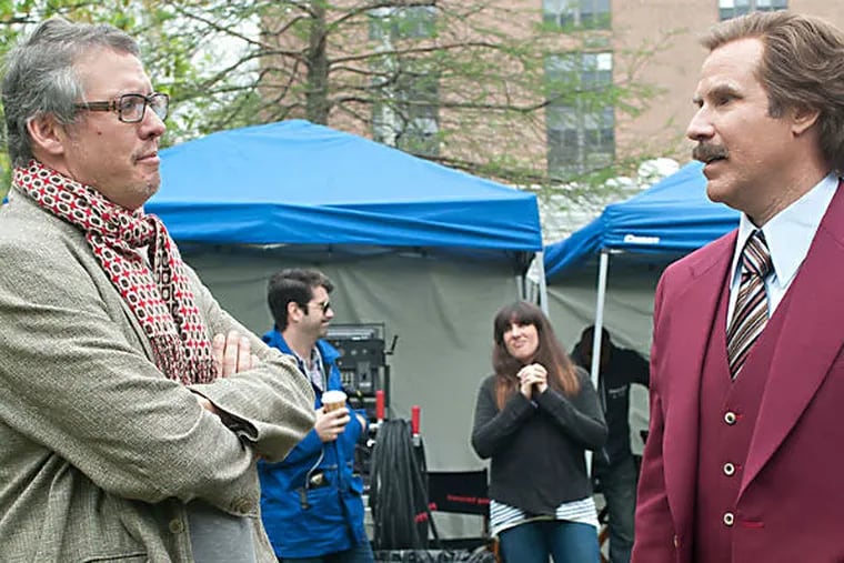 Adam McKay (left) and Will Ferrell during filming of &quot;Anchorman 2,&quot; which they cowrote.