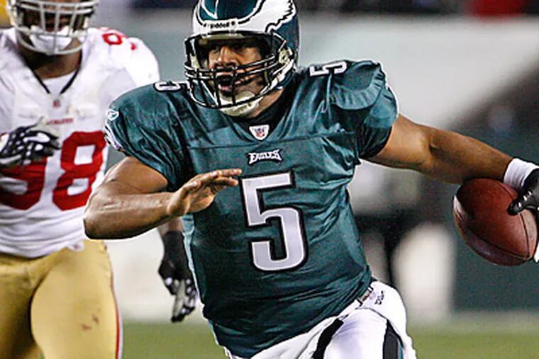 Donovan McNabb scrambles for a first down in a 27-13 win over the San Francisco 49ers. ( Ron Cortes / Staff Photographer )