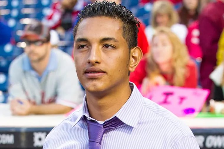 Pitching prospect Severino Gonzalez at a Phillies game in September 2013. (Chris Szagola/AP file photo)