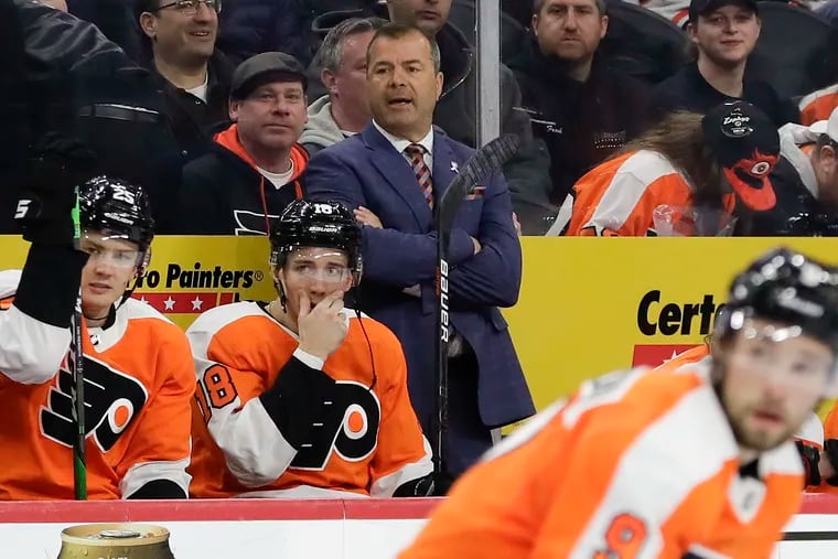 Flyers coach Alain Vigneault watches his team against the Florida Panthers on Feb. 10. He was named a coach-of-the-year finalist Wednesday.