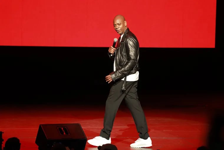 In this file photo, Dave Chappelle performs at Radio City Music Hall in New York. The comic performed along with the Roots at the Roots Picnic at the Wells Fargo Center in Philadelphia on Friday night.