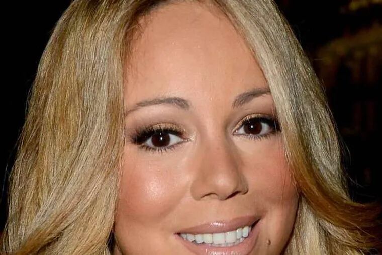 Mariah Carey's free to dish, but her soon-to-be ex is not.