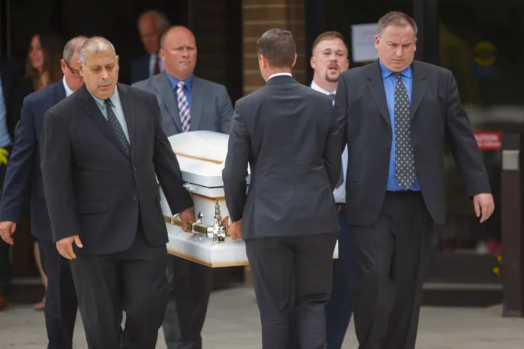 The casket of 7-year-old Kayden Mancuso is carried to the hearse after the funeral services at St. John the Evangelist Catholic Church in Lower Makefield Township, PA on Saturday August 11, 2018.