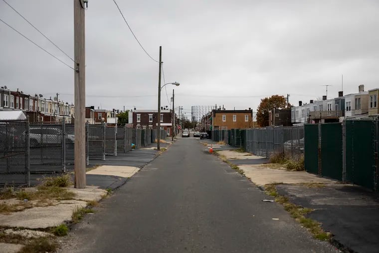 Lots are seen along Dover Street in Philadelphia's Grays Ferry neighborhood. The city sold them for $1 each in the 1990s, but property values have recently risen significantly.