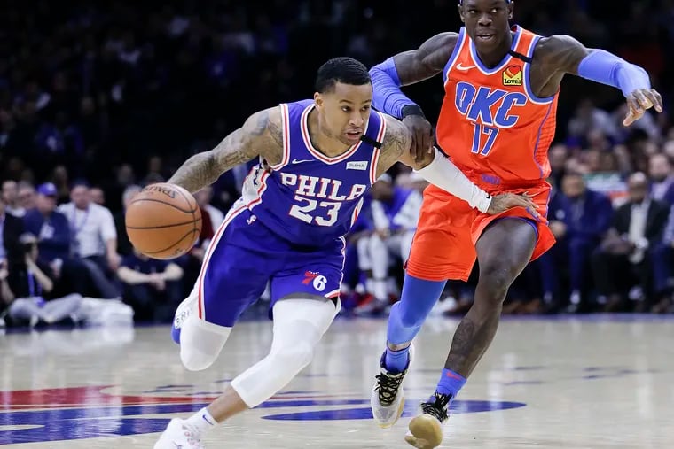 Sixers guard Trey Burke dribbling past Oklahoma City Thunder guard Dennis Schroder on Monday.