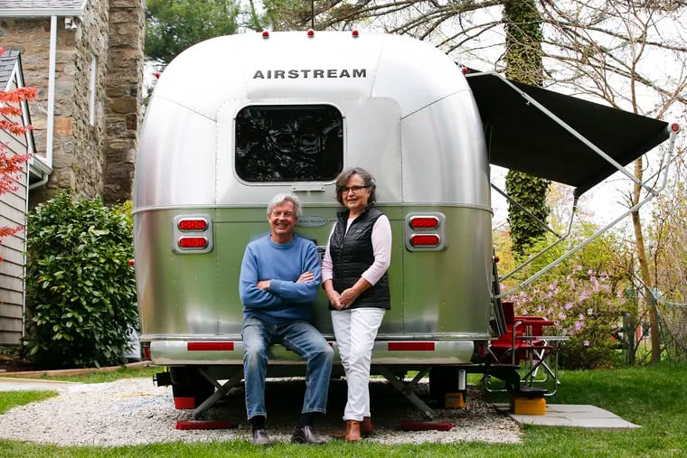 Mike and Stacy Schafer logged 3,039 miles last summer in their 200-square-foot Airstream Flying Cloud trailer, parked here outside their Havertown home. They sold a vacation home in the Poconos so they could travel across the U.S.