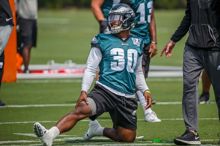 Eagles running back Corey Clement, #30, stretches before Monday's practice at the NovaCare Center on August 27, 2018. MICHAEL BRYANT / Staff Photographer