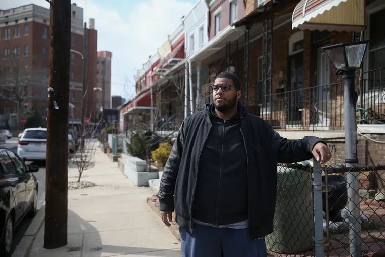On Thursday, March 7, 2019, lawyer Spencer A. Hill Jr. stands near the spot where he was shot March 4 in an apparent robbery attempt outside his home in West Philadelphia.