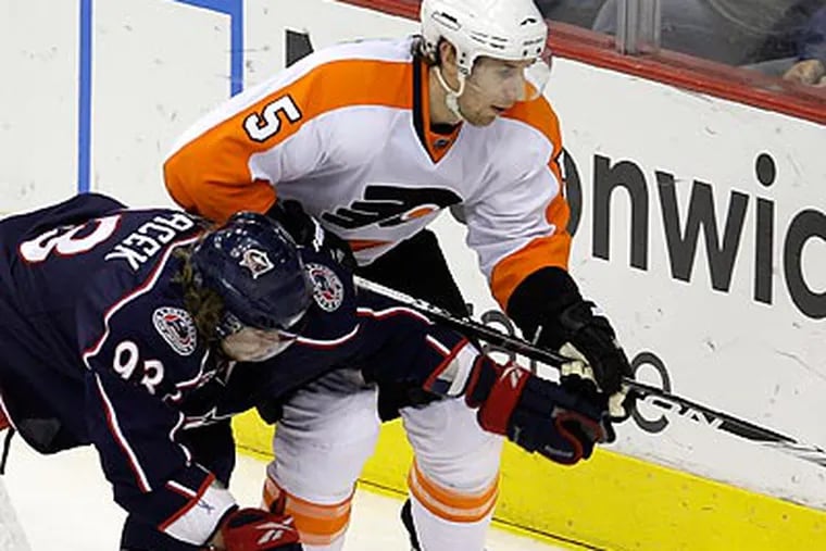 "We got exactly what we deserved," Flyers coach Peter Laviolette said of his team's 2-1 loss in Columbus. (Jay LaPrete/AP)