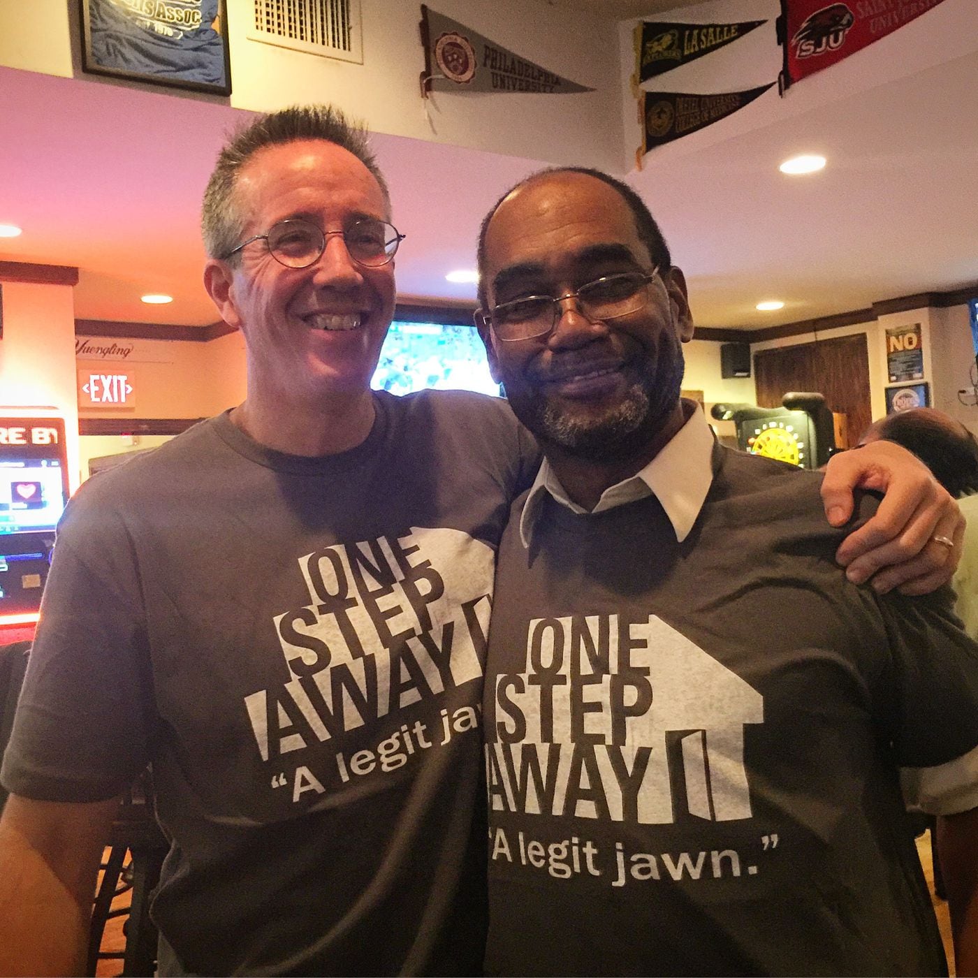 Kevin Roberts (left) during an event to benefit One Step Away, Philadelphia's homeless newspaper