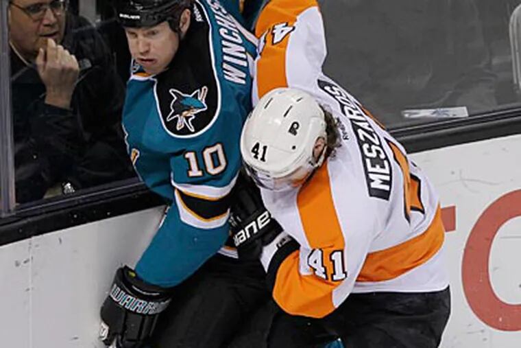 The Flyers hope their recent acquisitions will help their ailing defense. (Paul Sakuma/AP)