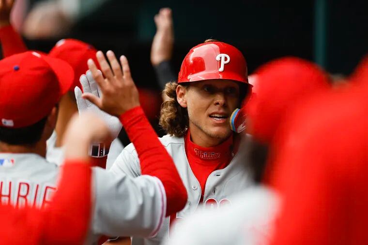 The Phillies' Alec Bohm is congratulated in the dugout after hitting a two-run home run on Thursday.